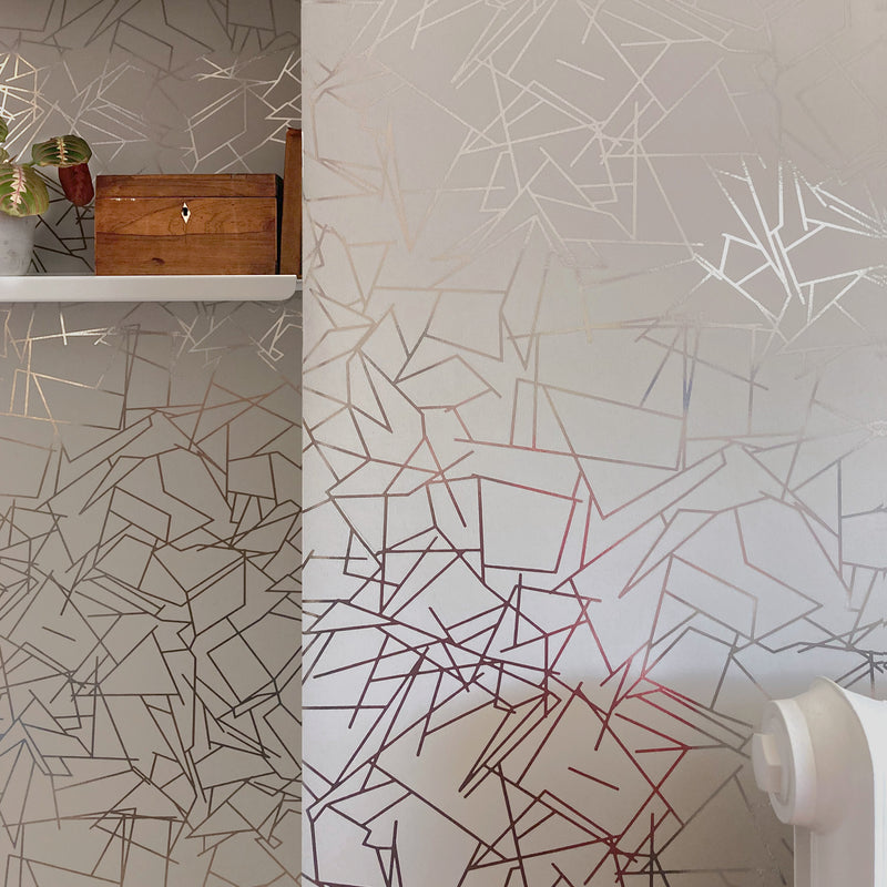 Angles pewter / limestone wallpaper by Erica Wakerly